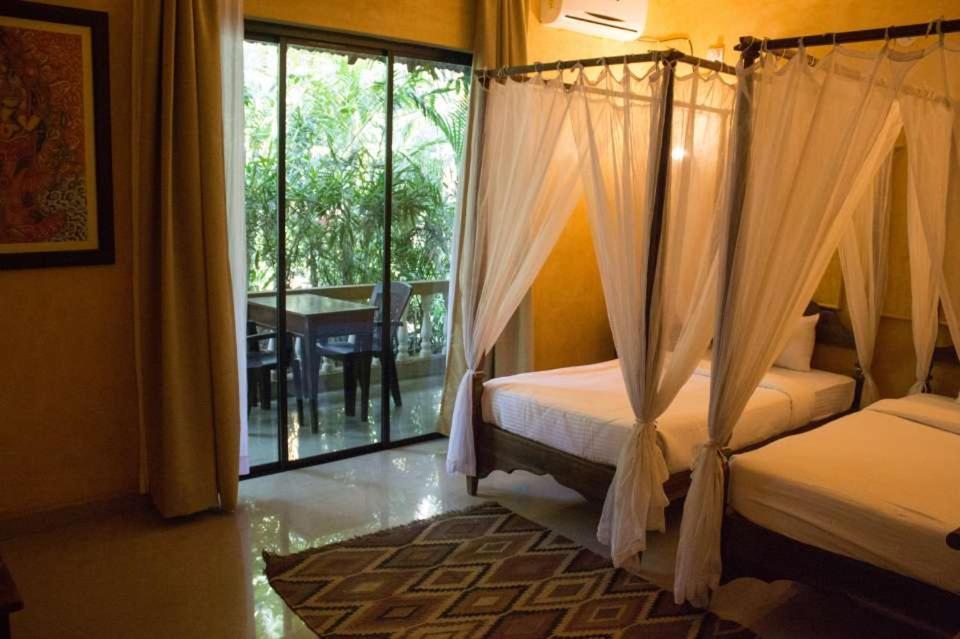Devarya Wellness Beach Resort Morjim Esterno foto
